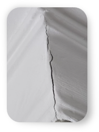 Crack between ceiling cornice and wall